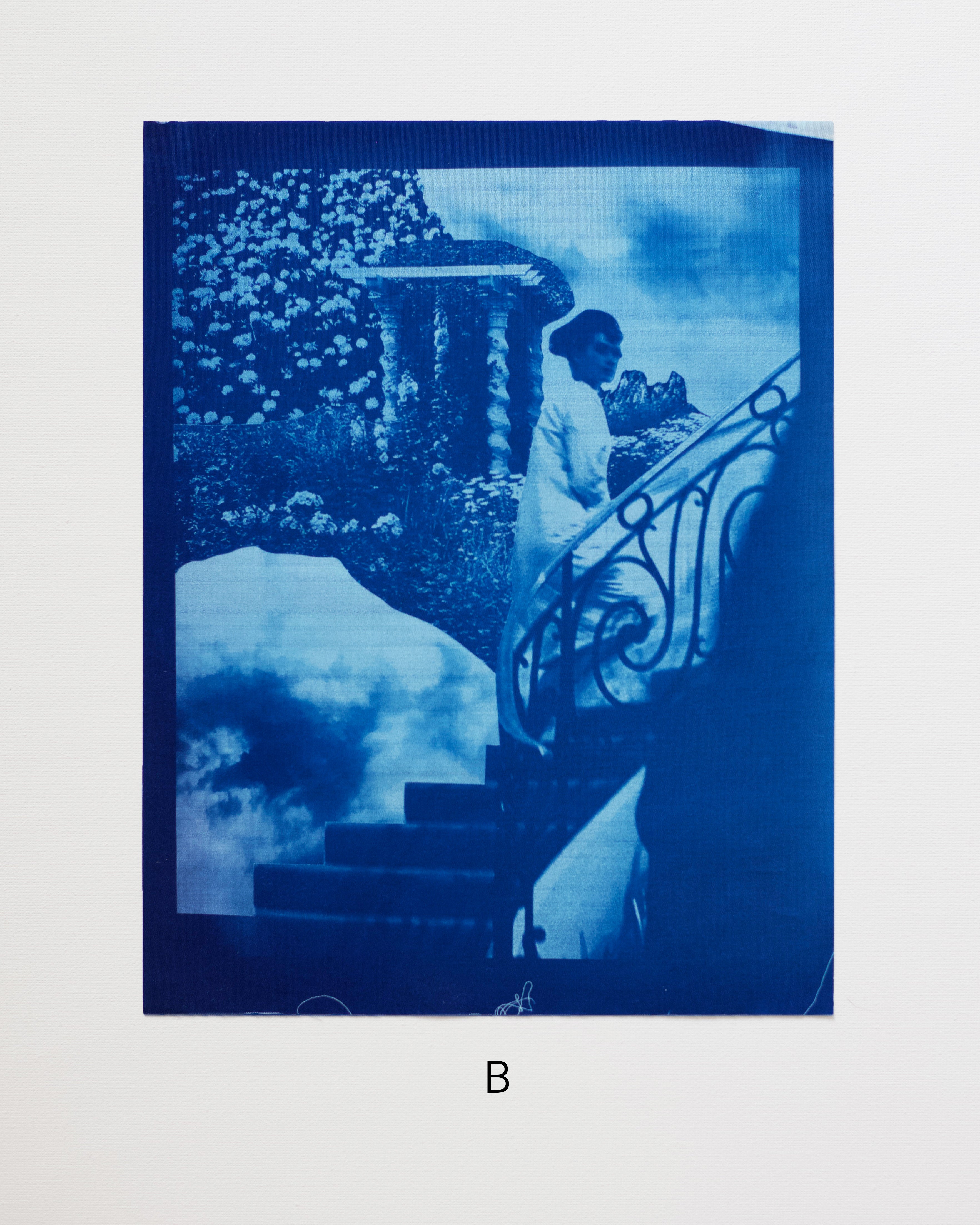 Cyanotype print of a person on a balcony with garden view